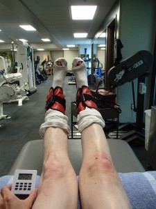 Doing reps of weighted leg lefts to strengthen my legs post surgery.