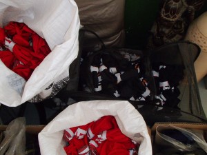 Booties of various sizes, in four-packs ready to be packed up.