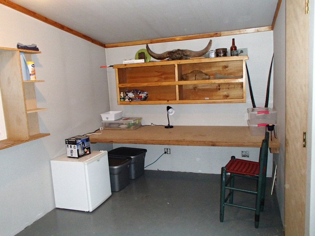 Desk and kitchen area.